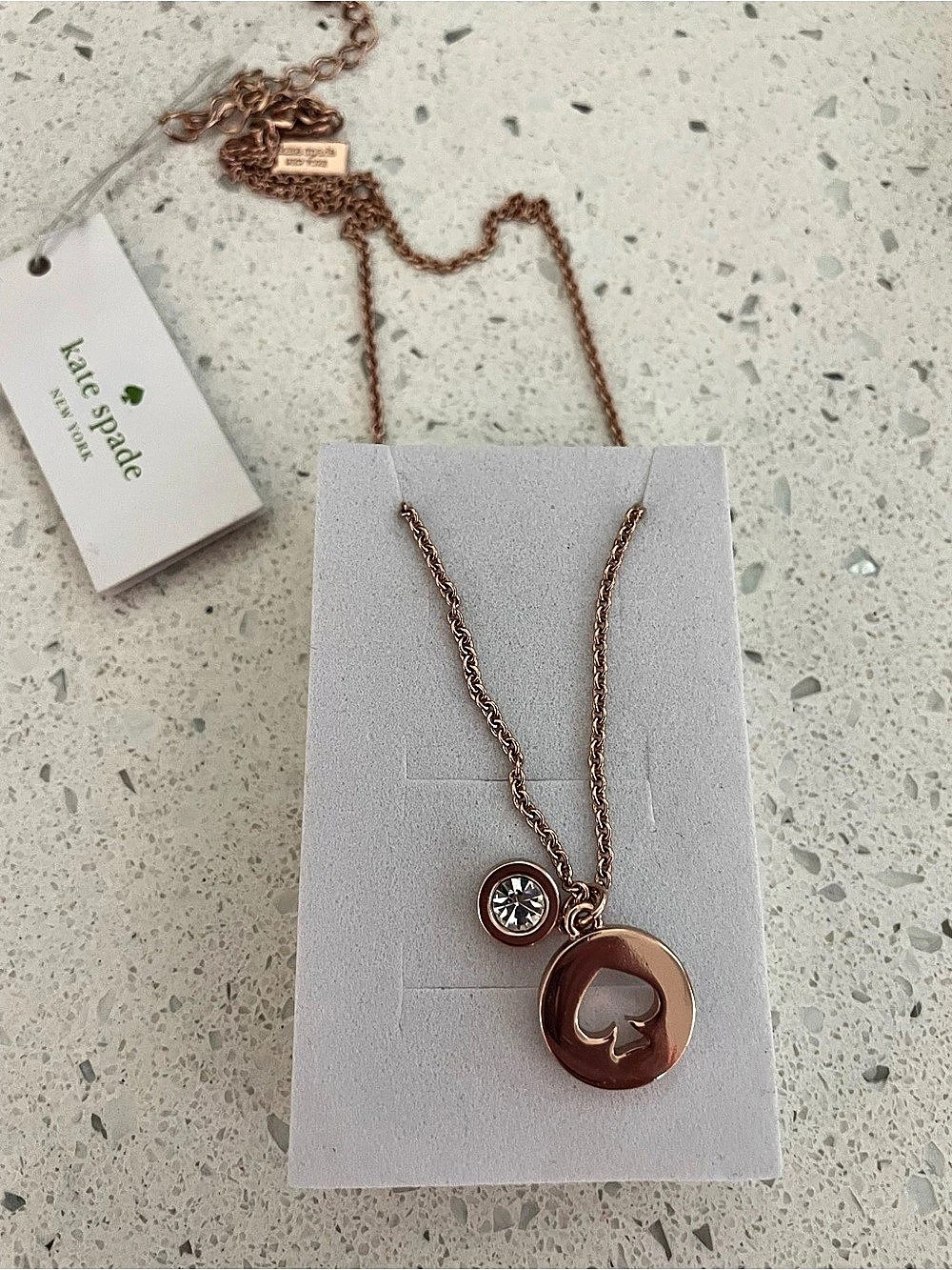 Kate Spade "Spot The Spade" Charm Necklace features a lovely cut-out spade penda